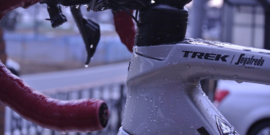 a close up of a bike with water droplets on it