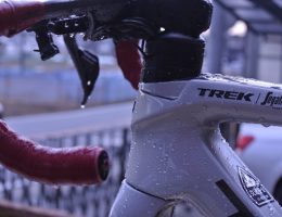 a close up of a bike with water droplets on it