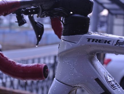a close up of a bike with water droplets on it